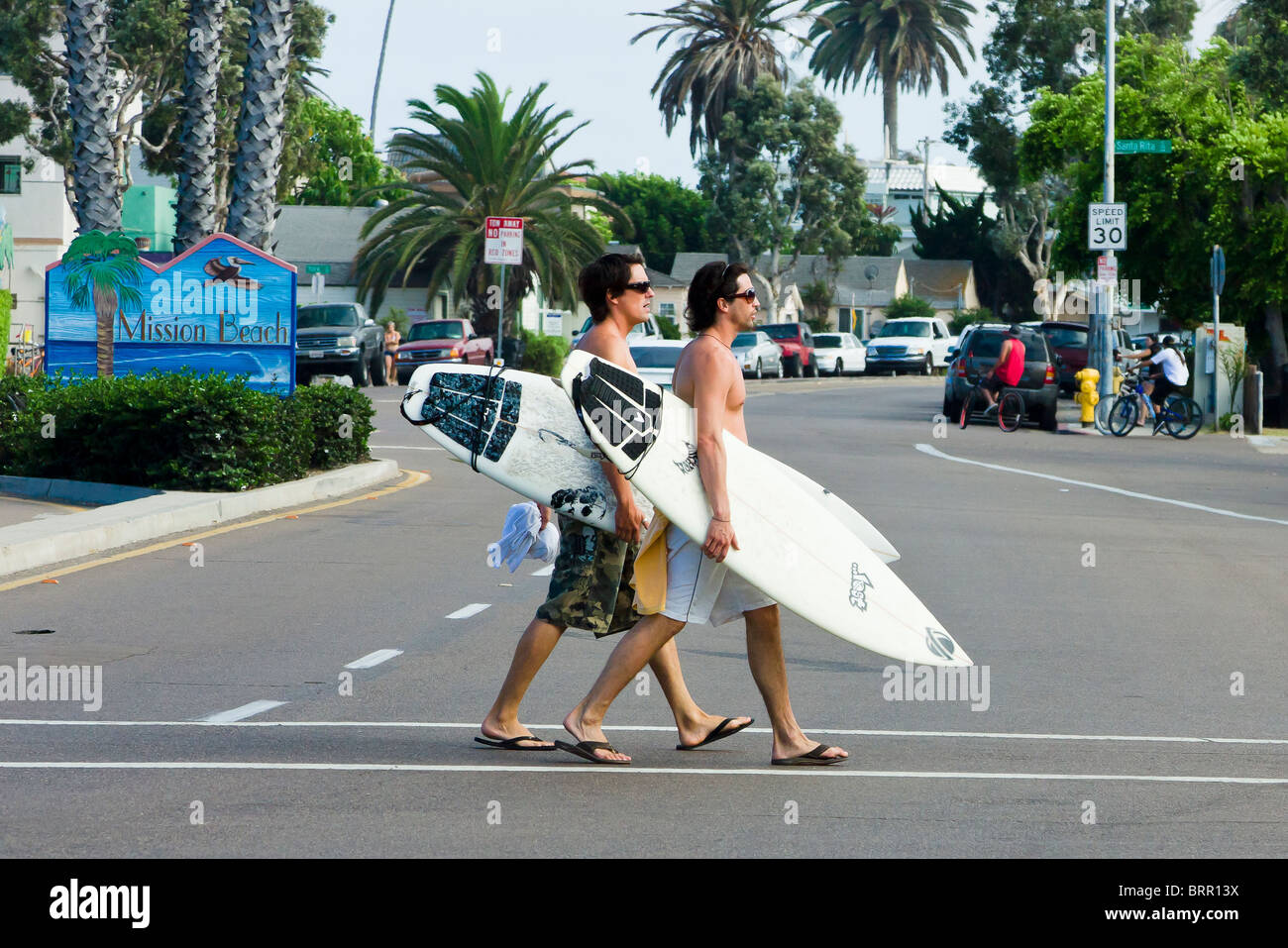 Surfers Crossing the Street, Mission Beach, California Stock Photo