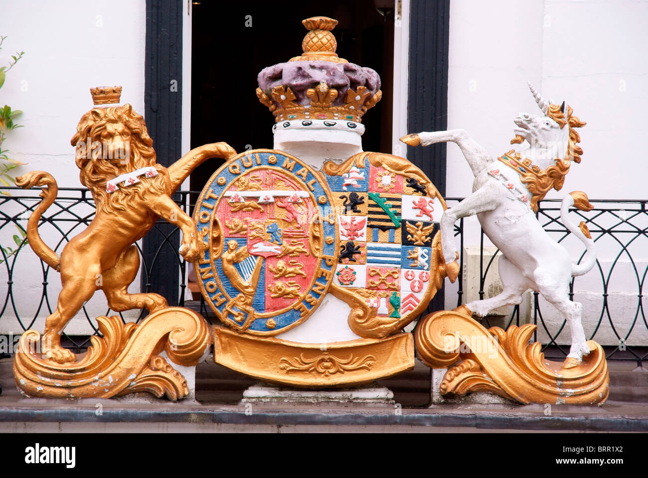 The Royal Coat of Arms on the external wall of a building Stock Photo