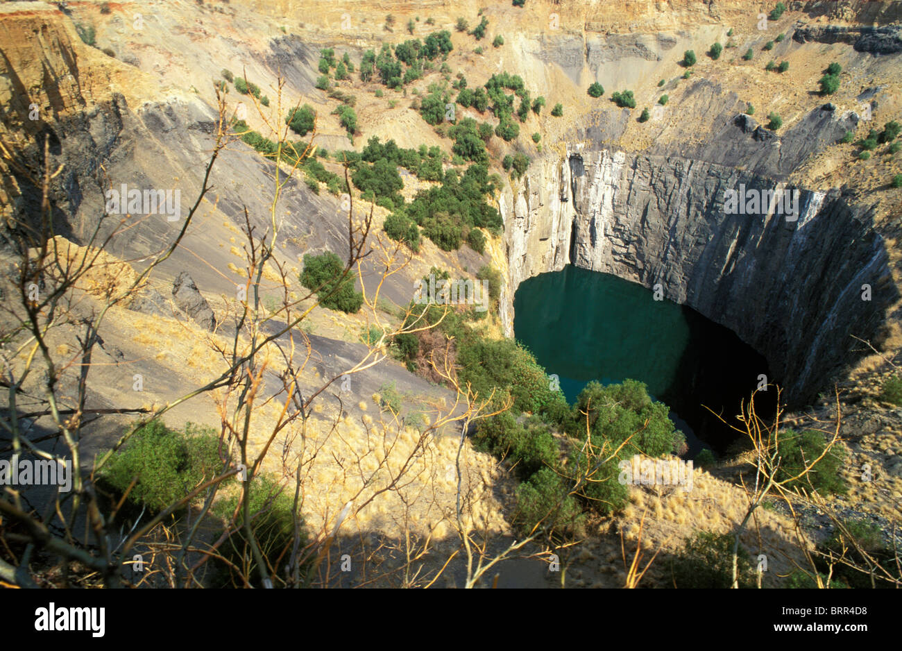 The De Beers diamond mine in Kimberley South Africa being filled with  re-processed mine dump tailings Stock Photo - Alamy