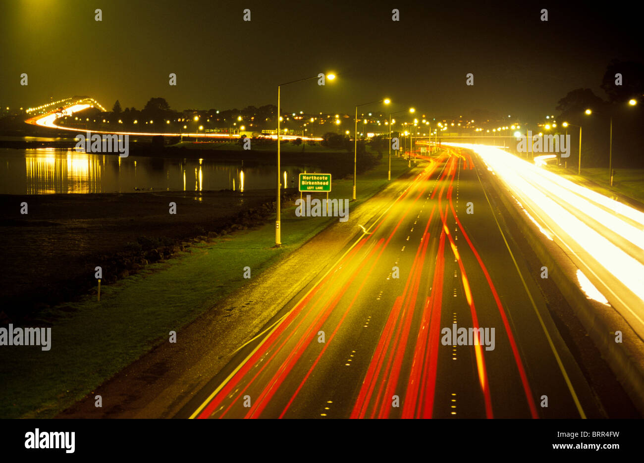 Light trails on the road over Sydney harbour bridge at night Stock ...
