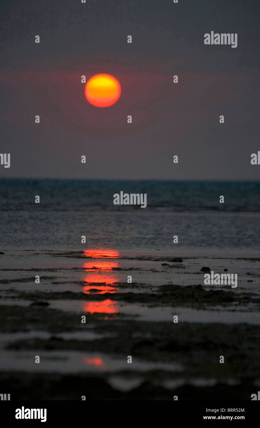 Sunset over the ocean Stock Photo