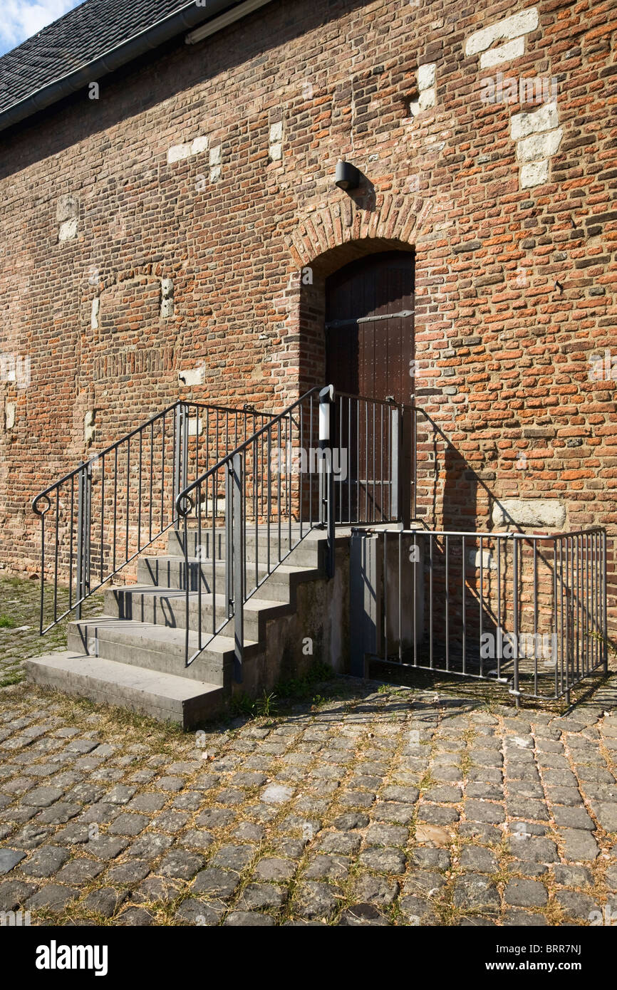 Old back door with new staircase, Medieval Centre, Zons on the Rhine, Germany Stock Photo