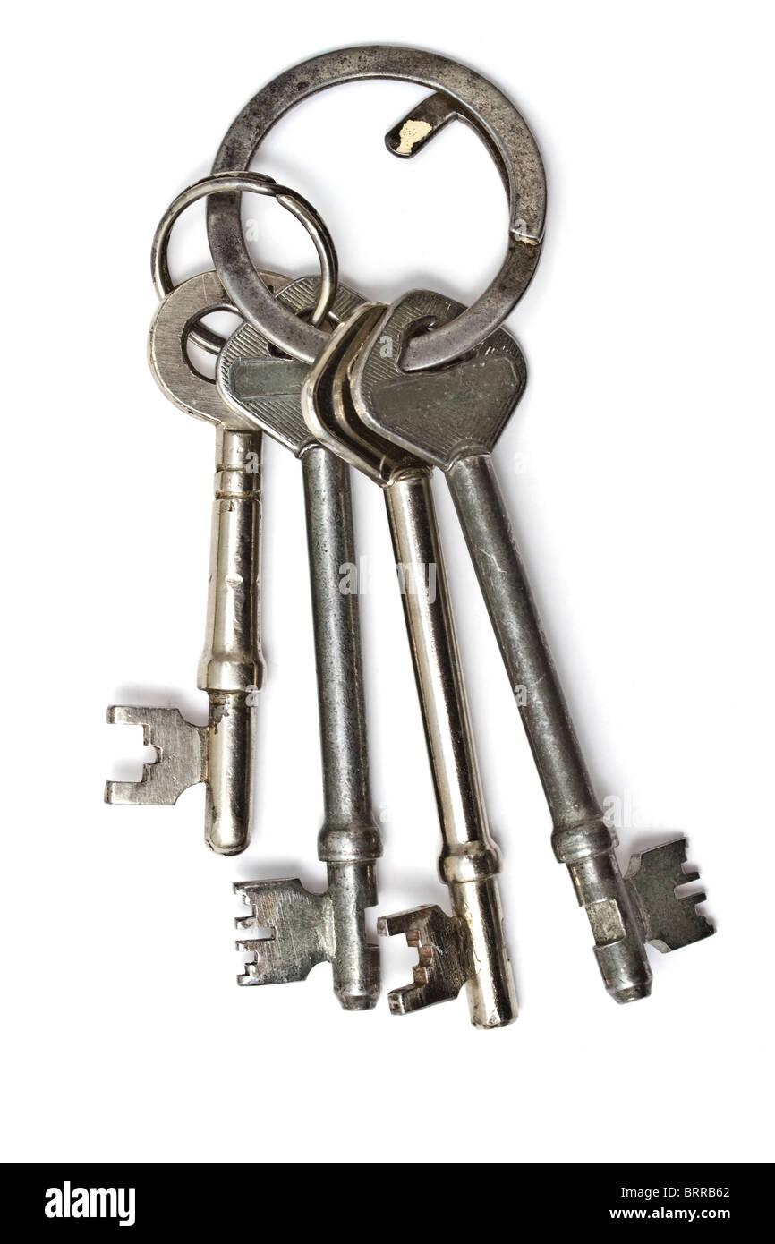 A bunch of antique keys isolated on white Stock Photo by ©belchonock  11552413