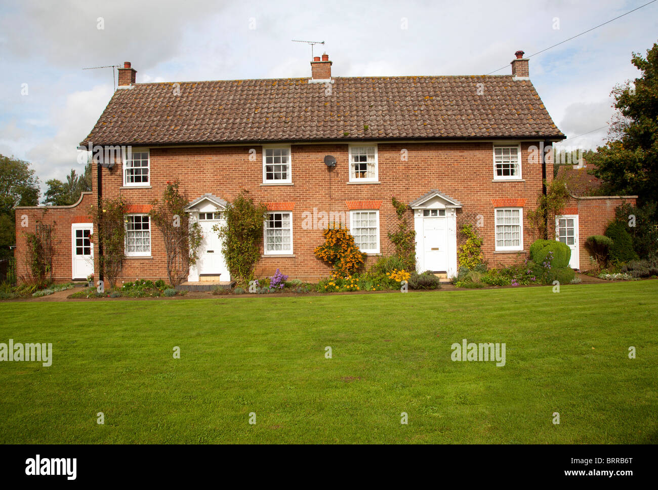Semi-detached village houses, Shootisham, Suffolk, England Stock Photo