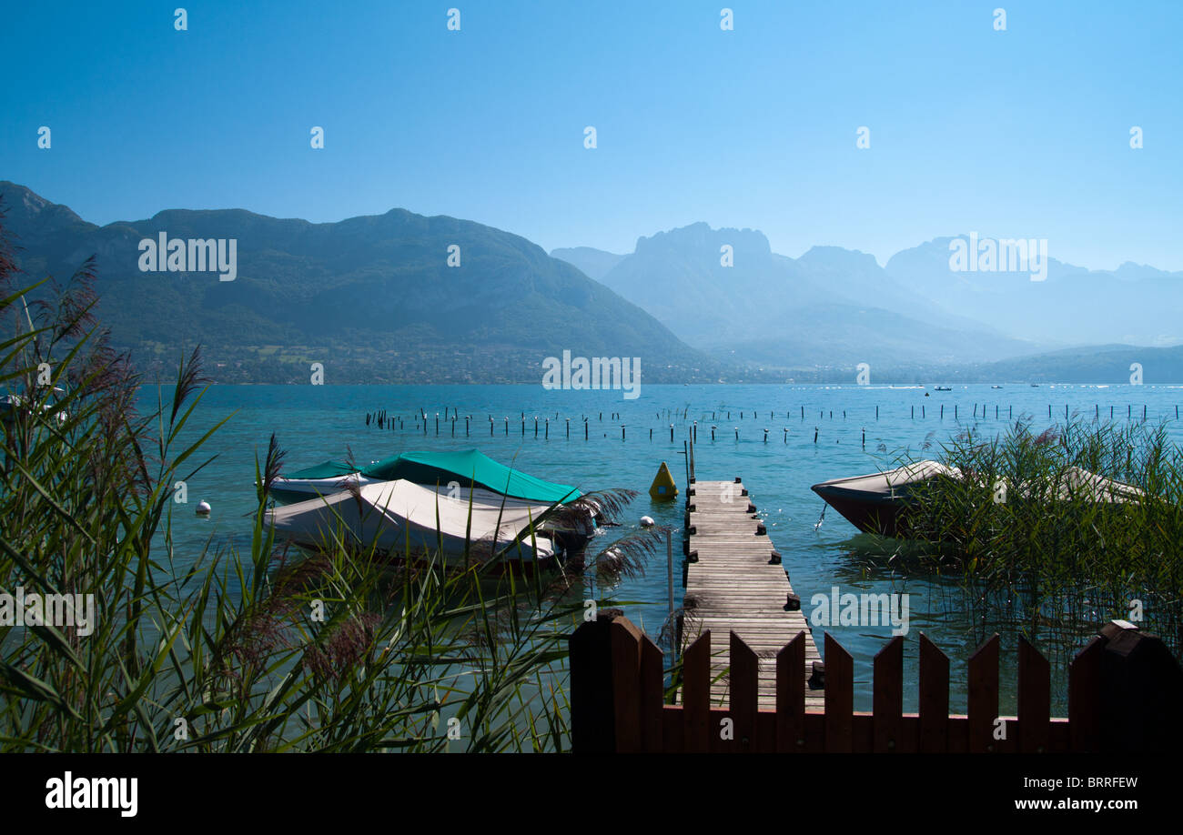 pontoon and boats in Lake Annecy at Sevrier Stock Photo