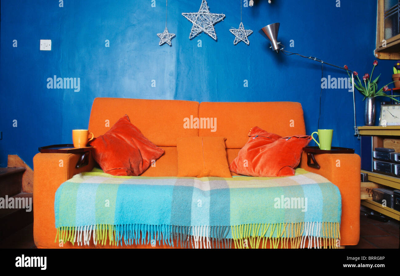 Green sofa in traditional country hires stock photography and images