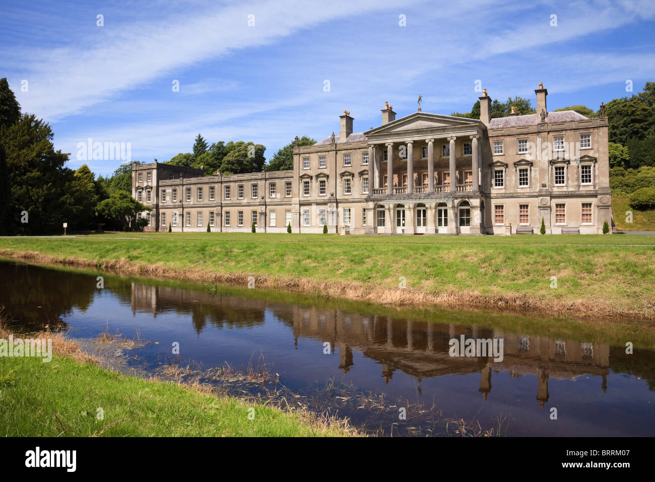Llandwrog, Gwynedd, North Wales, UK. 19th century Parc Glynllifon mansion house and Afon Llifon