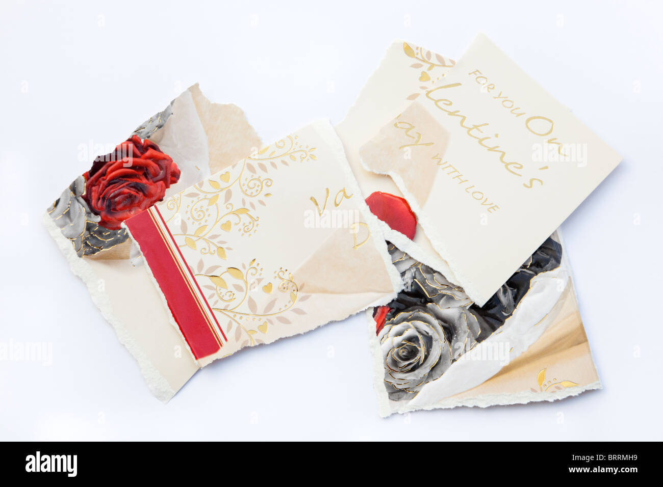 Torn pieces of a Valentine card on a white background Stock Photo