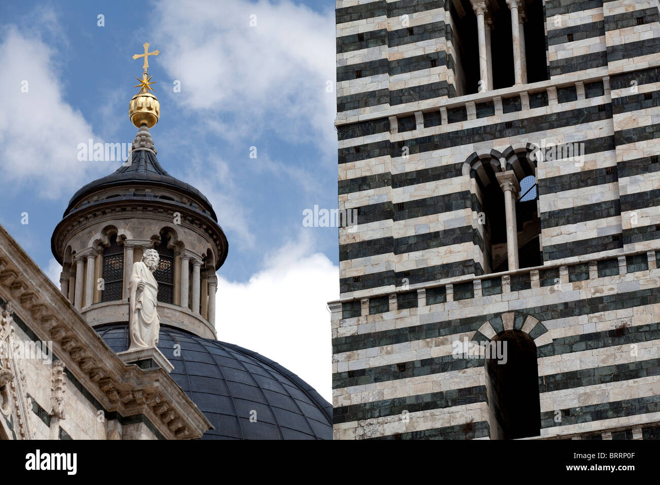 A close up view view of the top of the black and white iconic Cathedral dome in Sienna, Italy Stock Photo