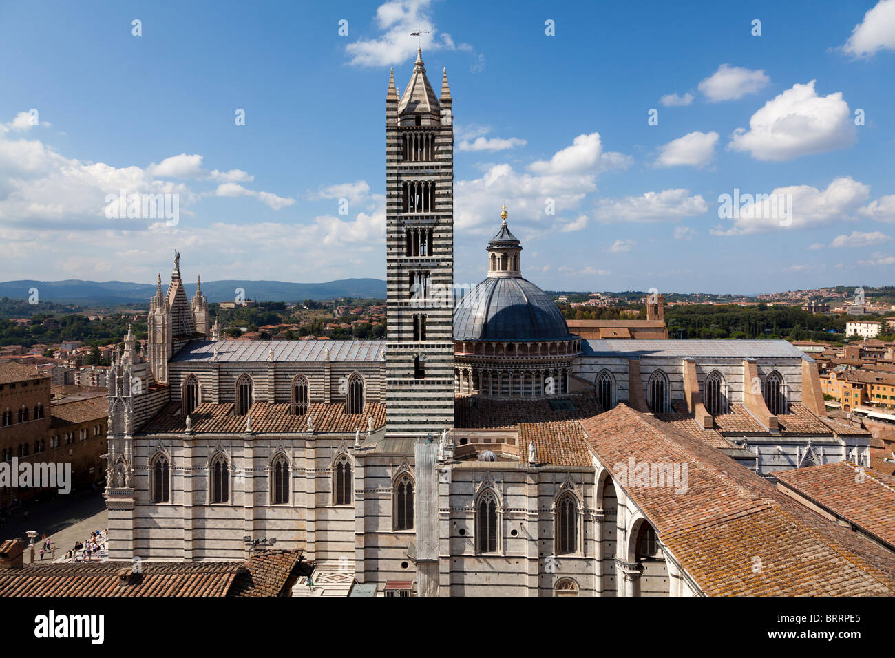A full frontal  view of the iconic cathedral in Sienna, and its famous dome in Tuscany Italy on a bright sunny day Stock Photo
