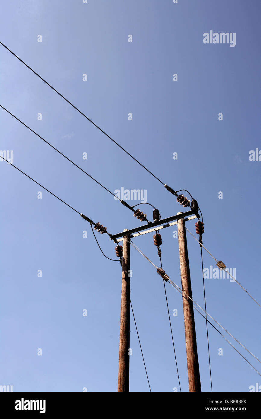 Power lines and a blue sky Stock Photo - Alamy