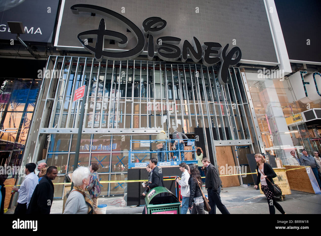 Workers prepare the new Disney store in Times Square in New York Stock Photo