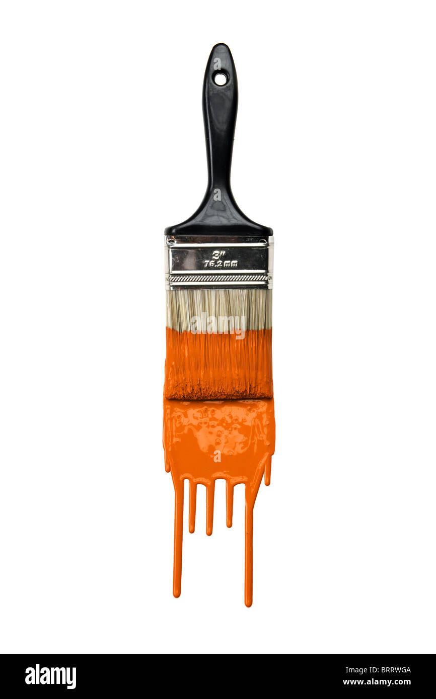 Paintbrush with dripping orange paint isolated over white background Stock Photo