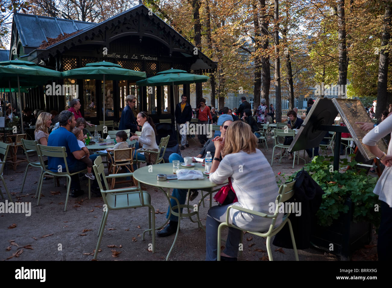 Paris, Cafe, France, Large Crowd People in Luxembourg Gardens, Urban Park, 'Jardin du Luxembourg', People Sharing Coffee in Outdoor Terrace, coffee shop, french cafe exterior Stock Photo