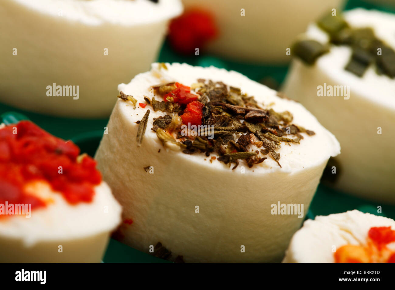 Cheese hors d'oeuvres with herbs and spices Stock Photo