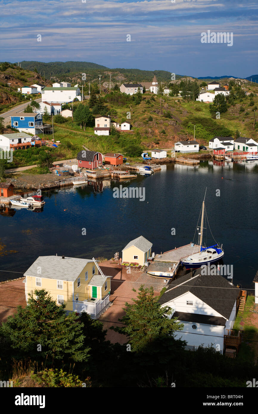 Scenic harbour view in a small bay with fishing docks, boats, jetties