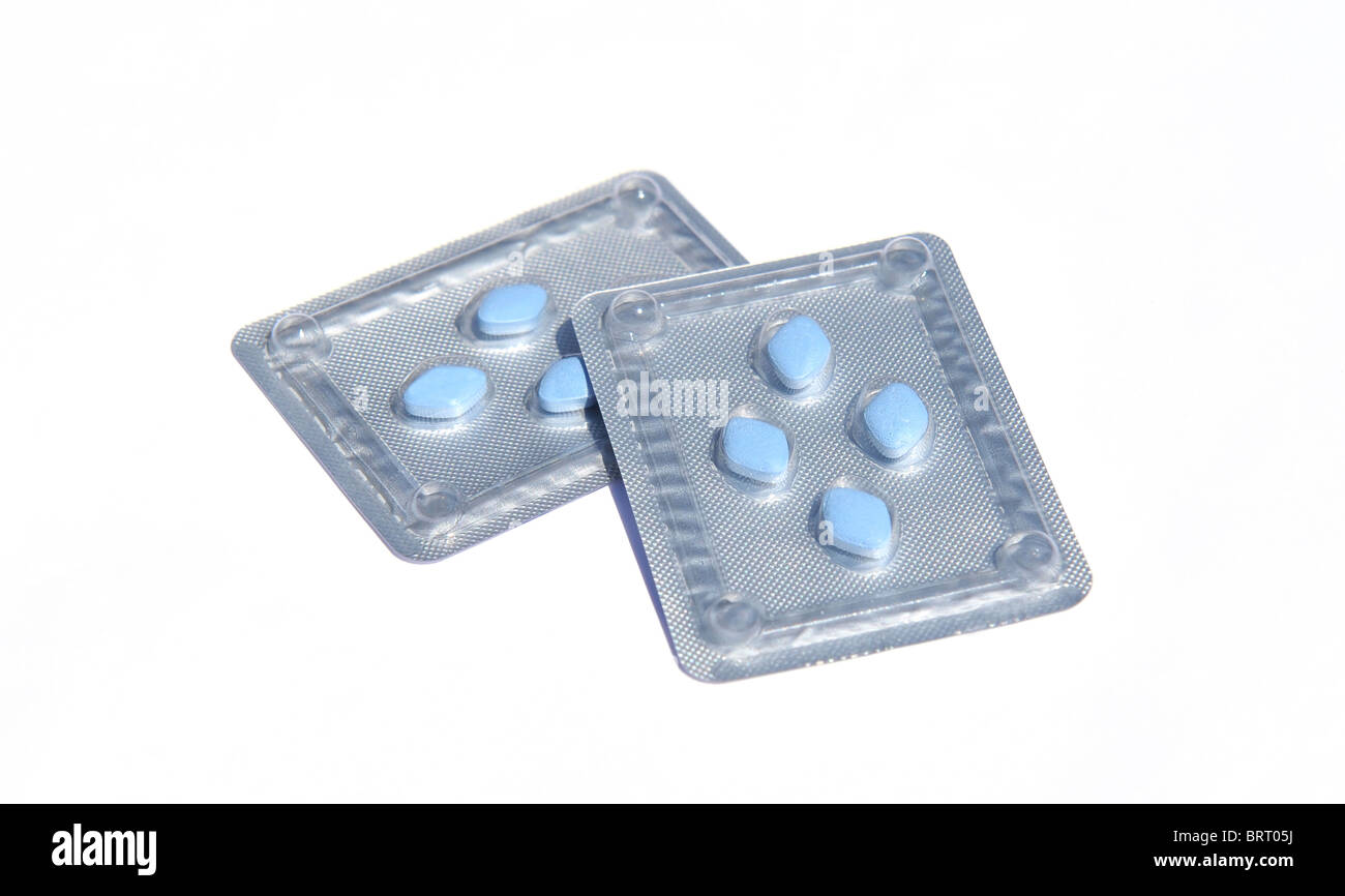Two blister packs of blue anti-impotence tablets Stock Photo