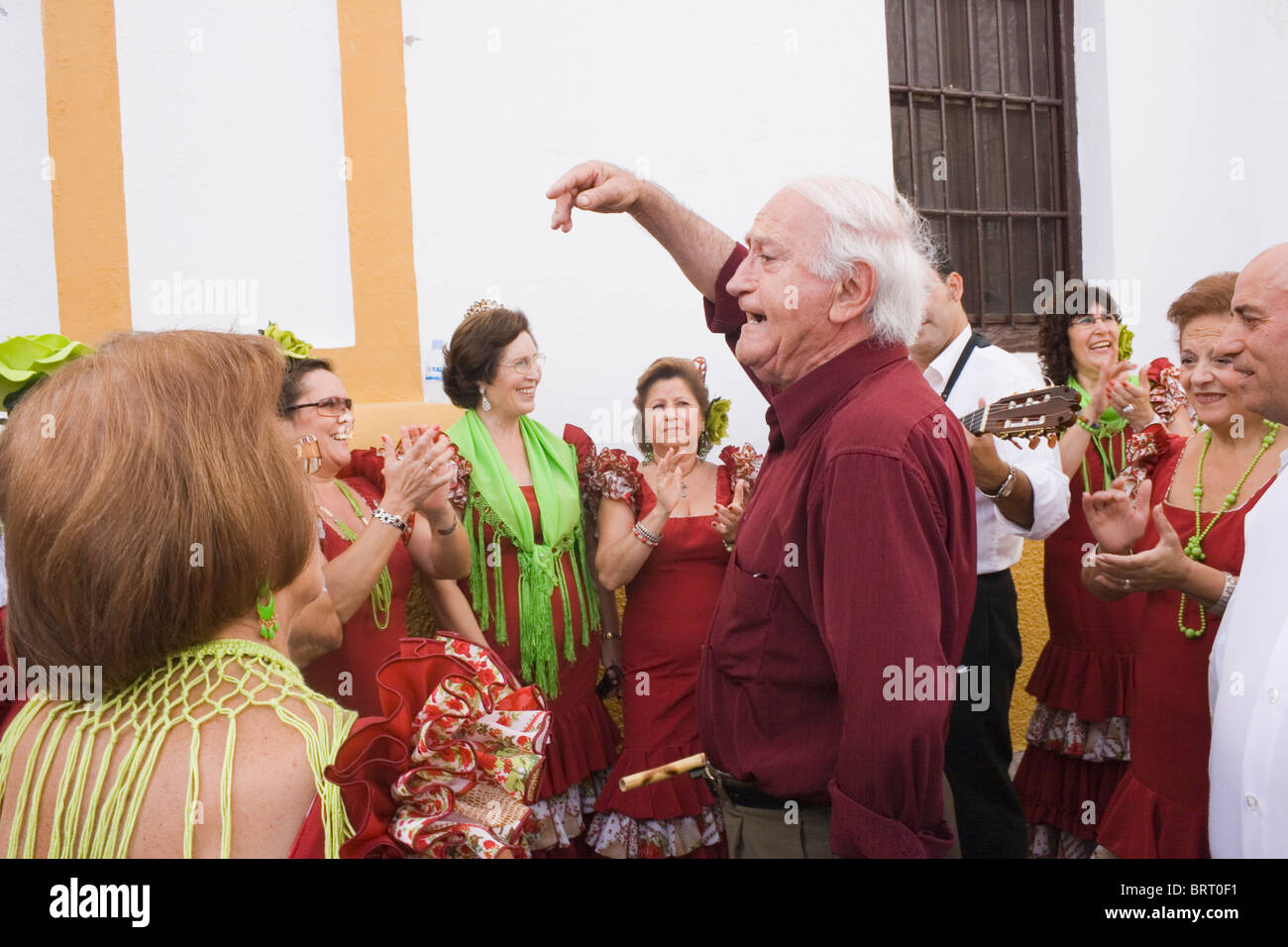 Spanish man and Rocio choir singing at the Festival of the Almond