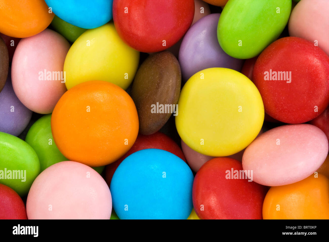 background of colorful candy coated chocolate sweets Stock Photo Alamy