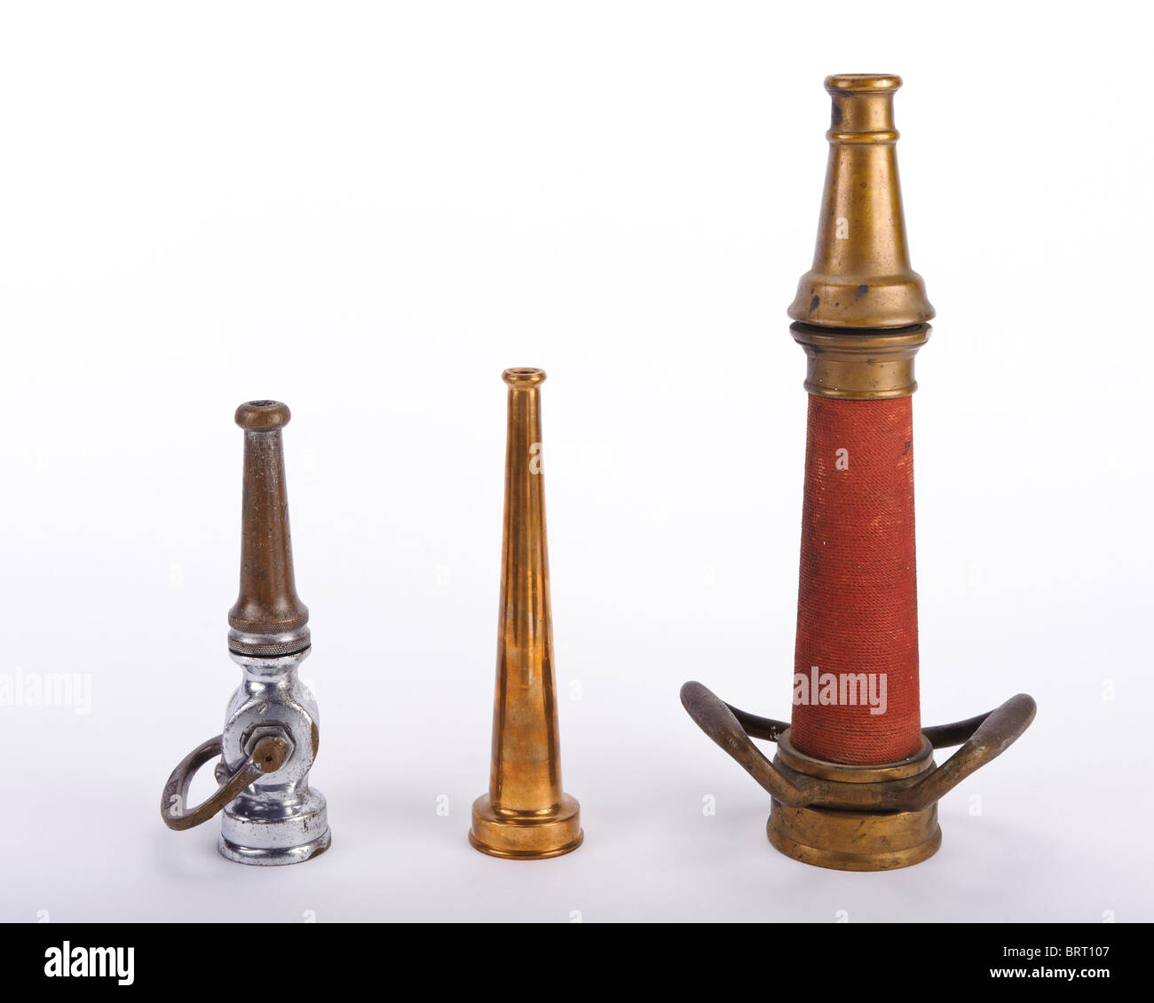 Antique brass fire nozzles Stock Photo Alamy