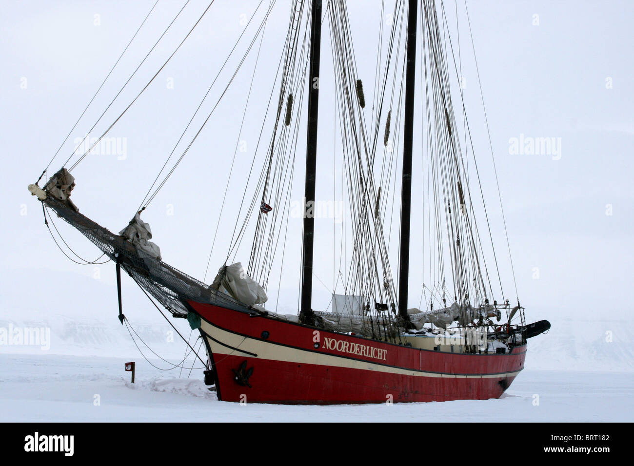 Noorderlicht, Svalbard 2009. Sailing ship in the ice. Stock Photo