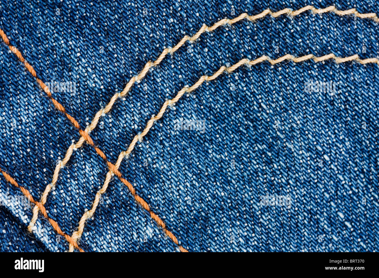 macro of stiching details on blue denim jeans Stock Photo