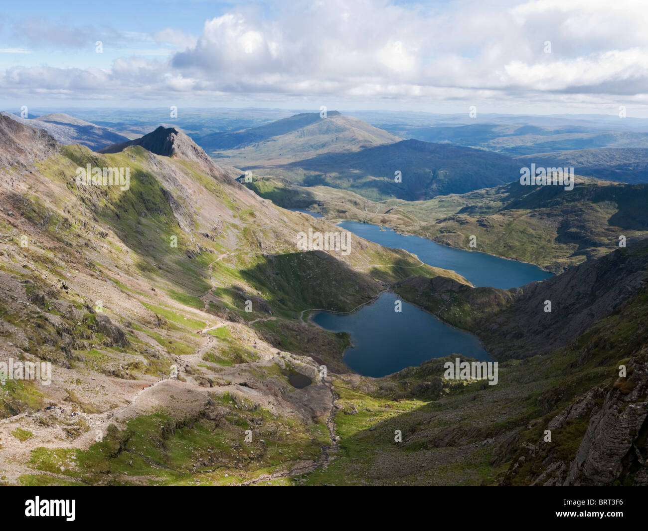 The view down Cwm Dyli from near the top of Snowdon, showing the the Pyg Track, Crib Goch, Glaslyn and Llyn Llydaw Stock Photo