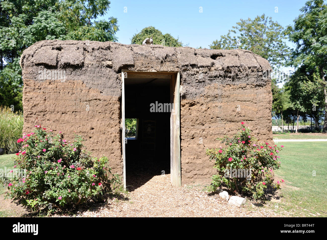 Mud house at the Dallas Arboretum, Texas, USA Stock Photo