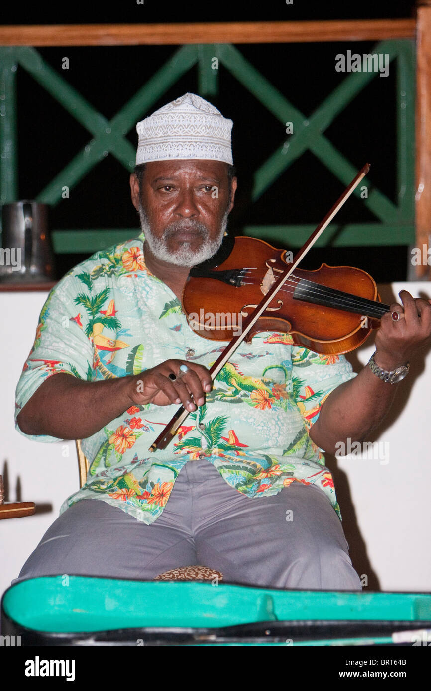 Zanzibar, Tanzania. Dr. Muhammad Ilyas, Director of Twinking Star Taarab Musical Group, a part of the Nadi Akhwan Safaa. Stock Photo