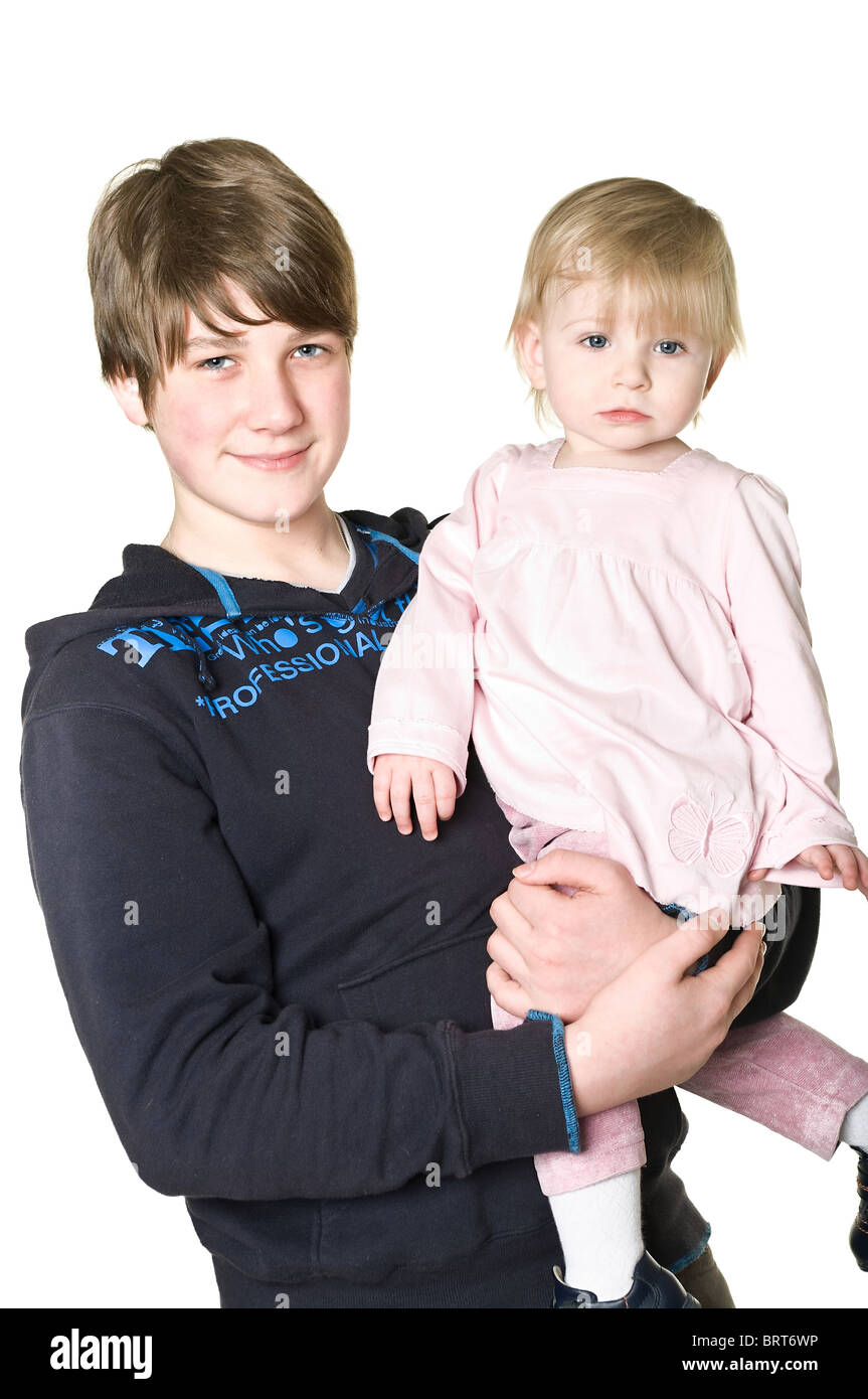 Two Children Brother And Sister Together One Year Old And Eleven