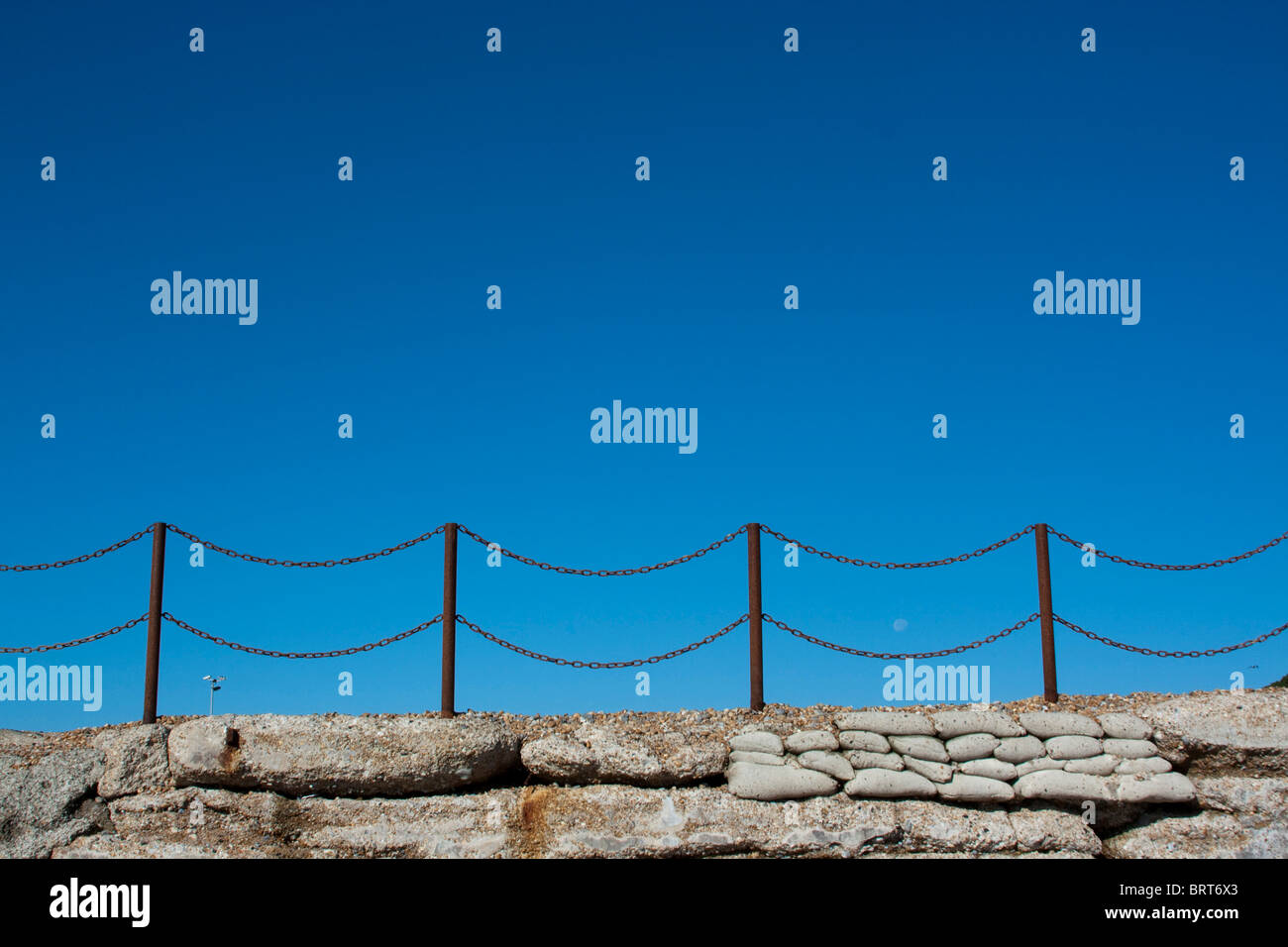 Rusty chain fence on Hastings beach, England Stock Photo Alamy