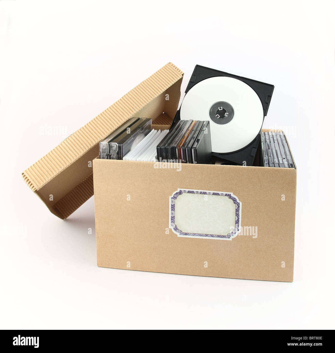 CD or DVD in a cardboard box  with space for text Stock Photo