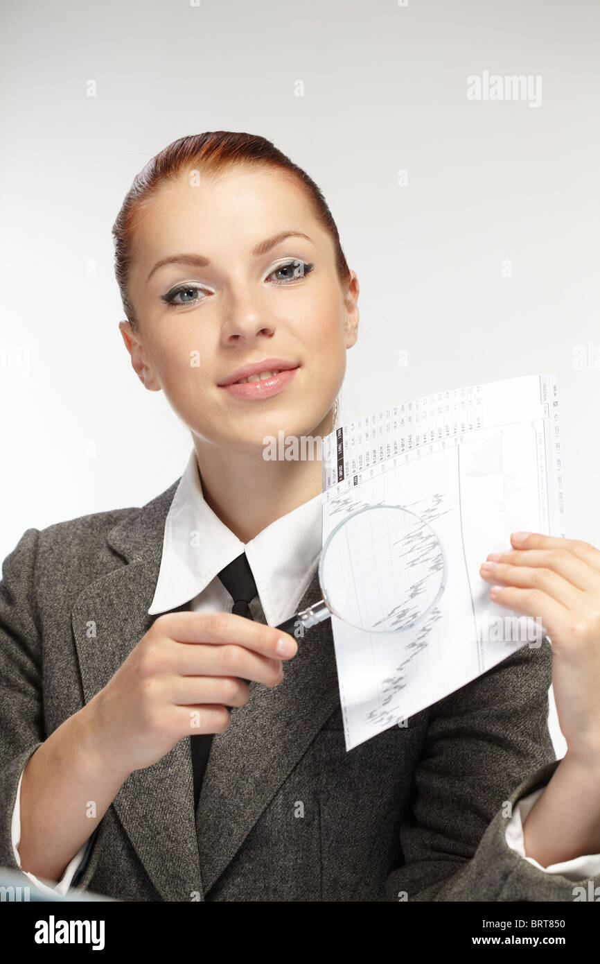 woman holding a magnifying glass in the hand Stock Photo - Alamy