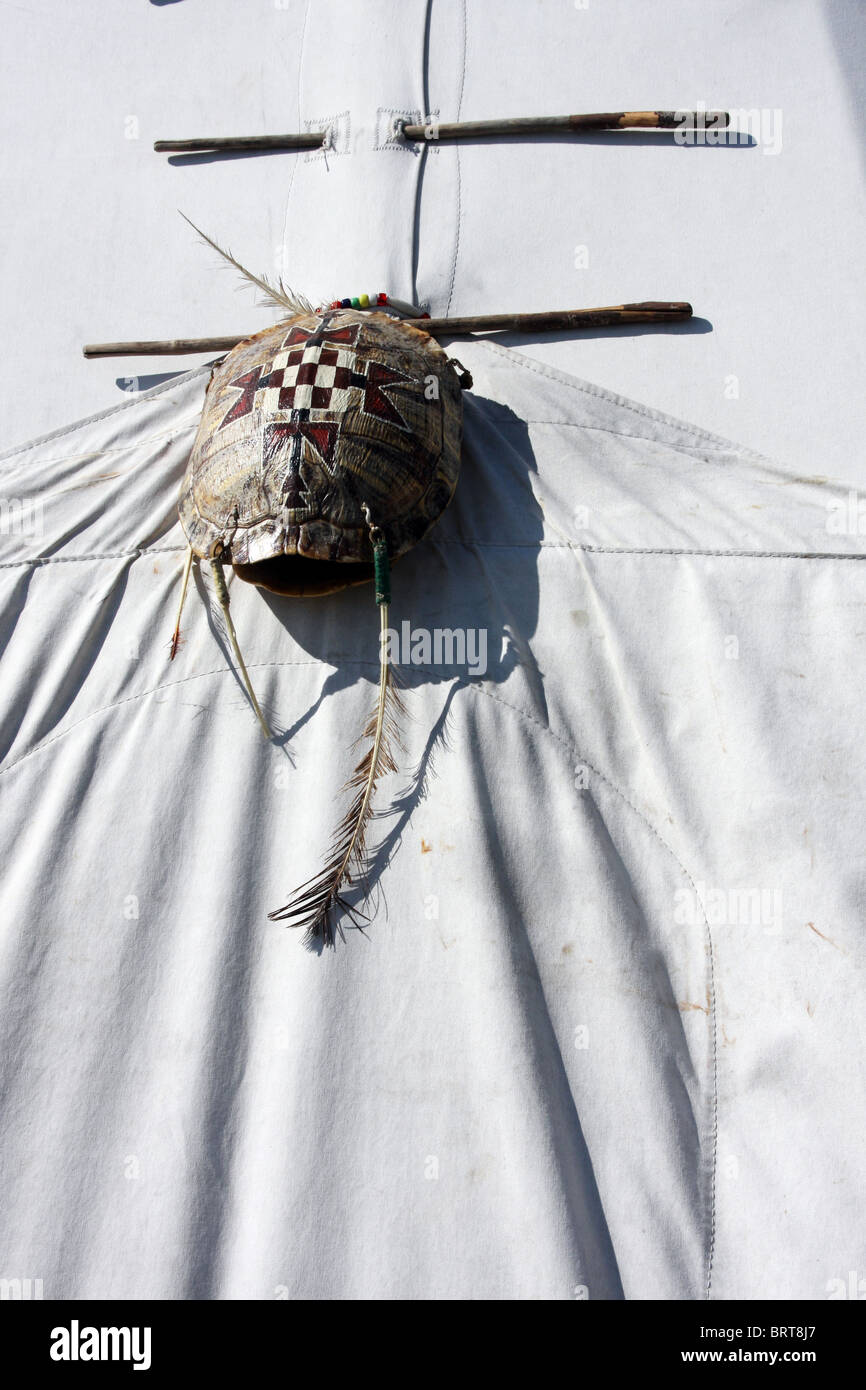Turtle shell on the door of a native american Indian tipi. Stock Photo