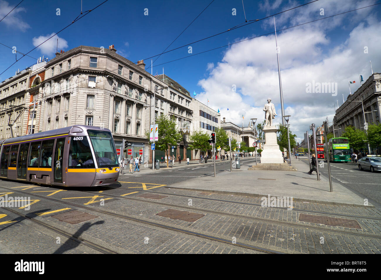 Dublin city centre with spire on O'Connell street and Luas tram. Stock Photo