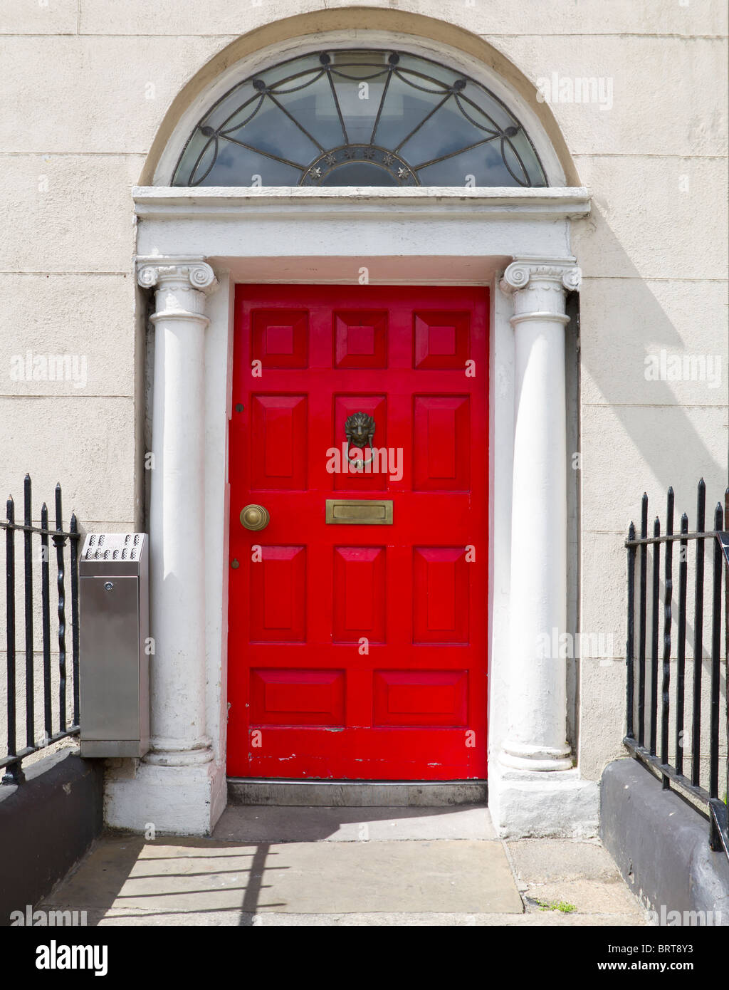 Shot of a classic red Irish door Stock Photo Alamy