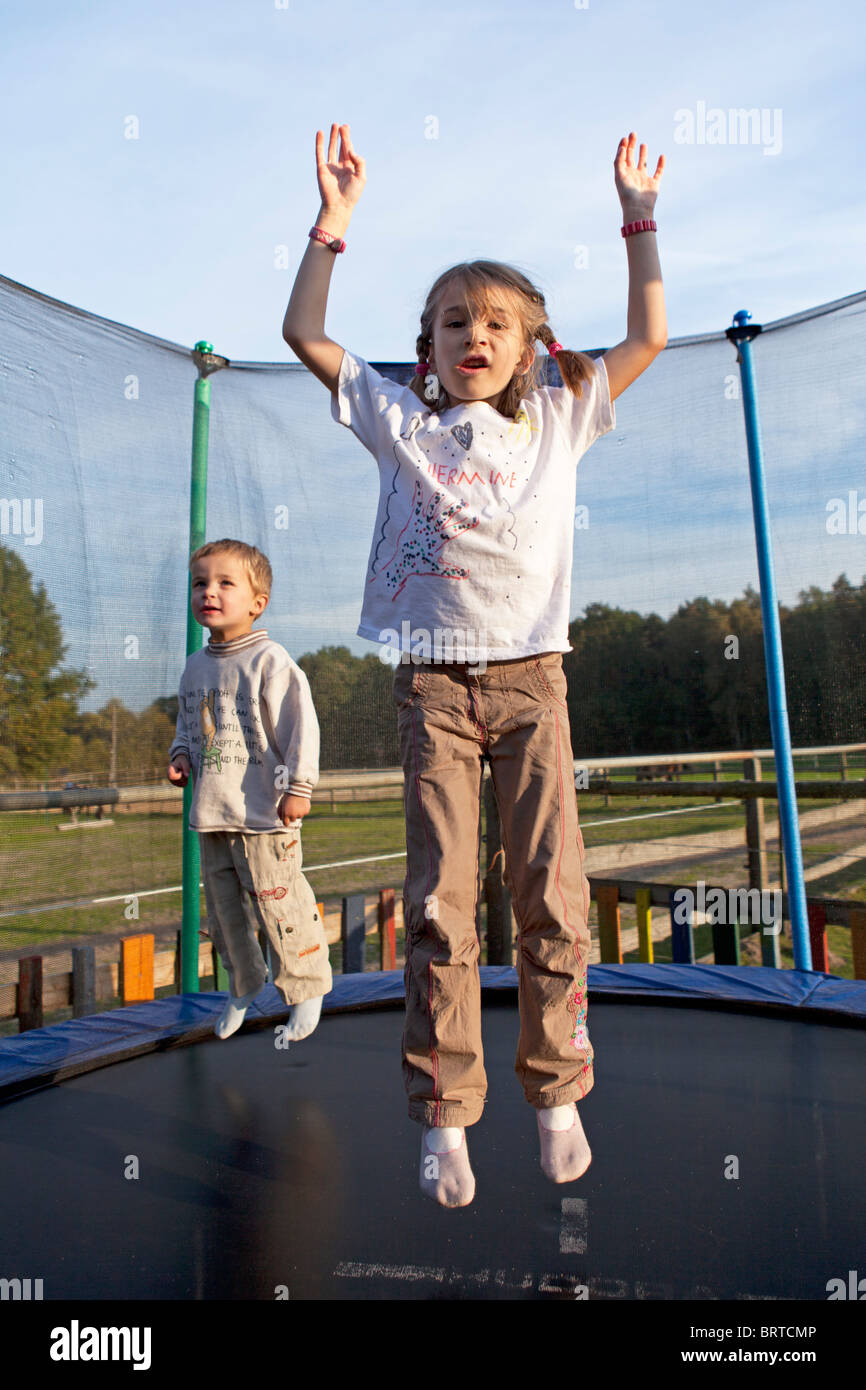 young children on a trampoline Stock Photo Alamy
