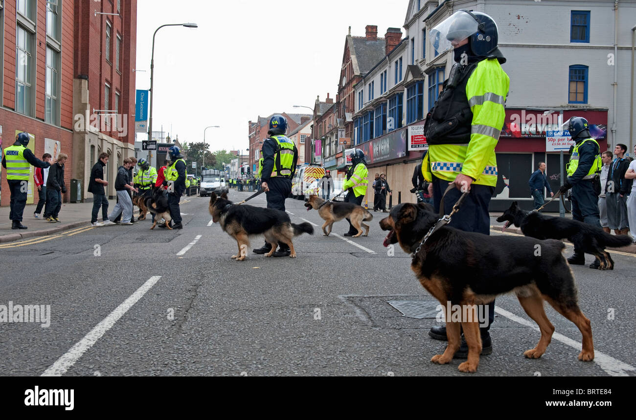 Police Dog Unit stand guard as The English Defence League demonstrate in Leicester. 9th October 2010. Stock Photo