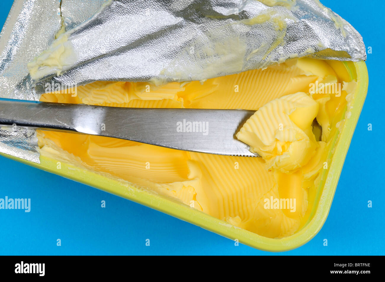 Knife In Butter Stock Photo Alamy