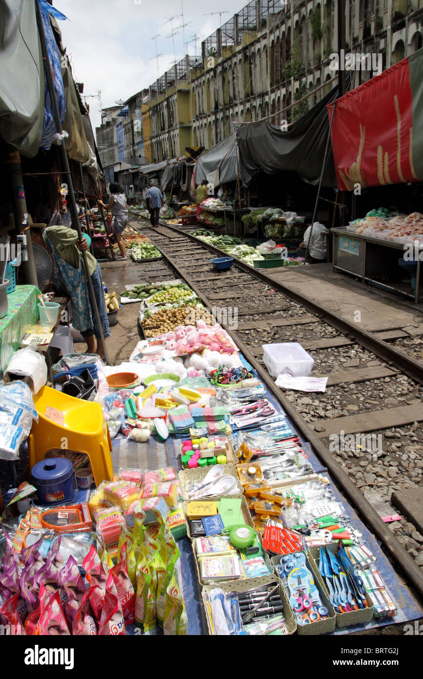 A food market on the rail tracks , Maeklong railway market , Thailand Stock Photo