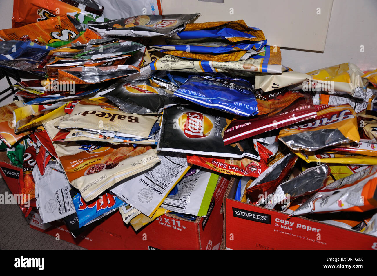 Pile of empty bags from chips and snacks prepared to be recycled Stock  Photo - Alamy