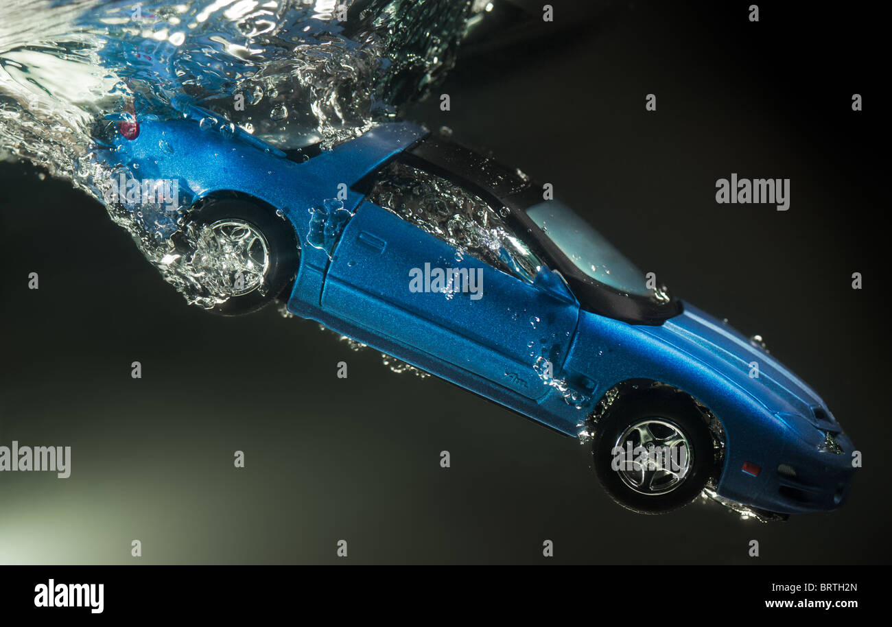 Toy car goes underwater Stock Photo