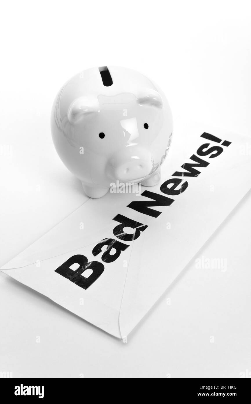 Bad News and Piggy Bank, concept of finance problems Stock Photo