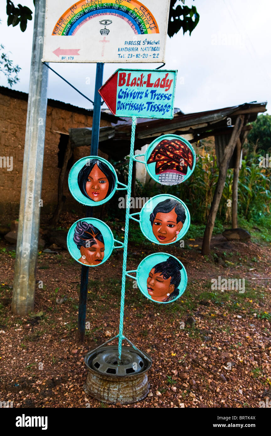 A sign for a local women's beauty parlour in Natitingou, Benin. Stock Photo