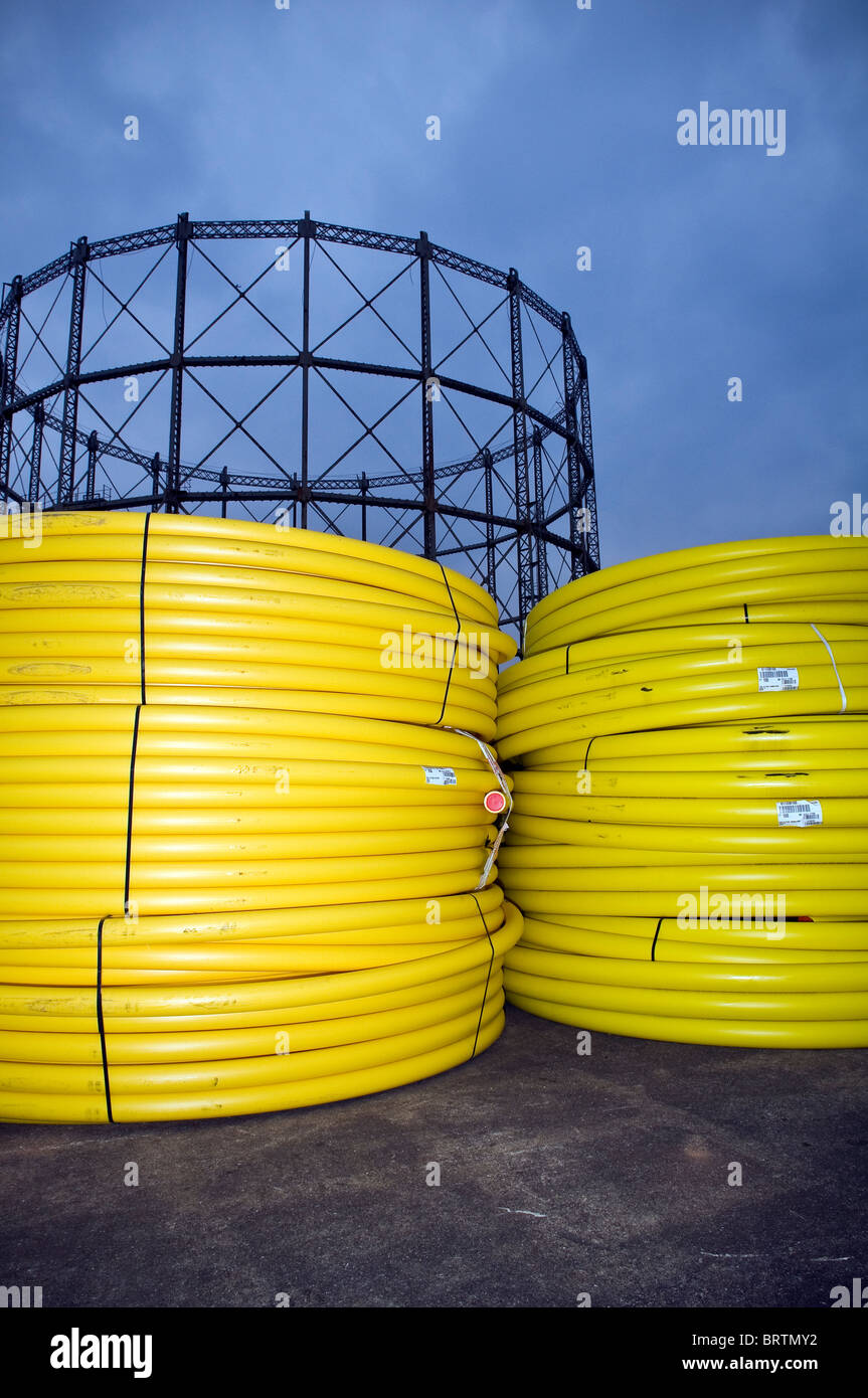 Coiled plastic gas pipes at a gasworks in Cardiff, South Wales, UK