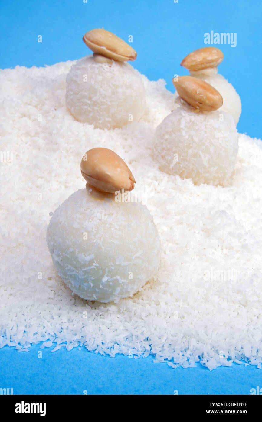 coconut balls with nuts Stock Photo Alamy