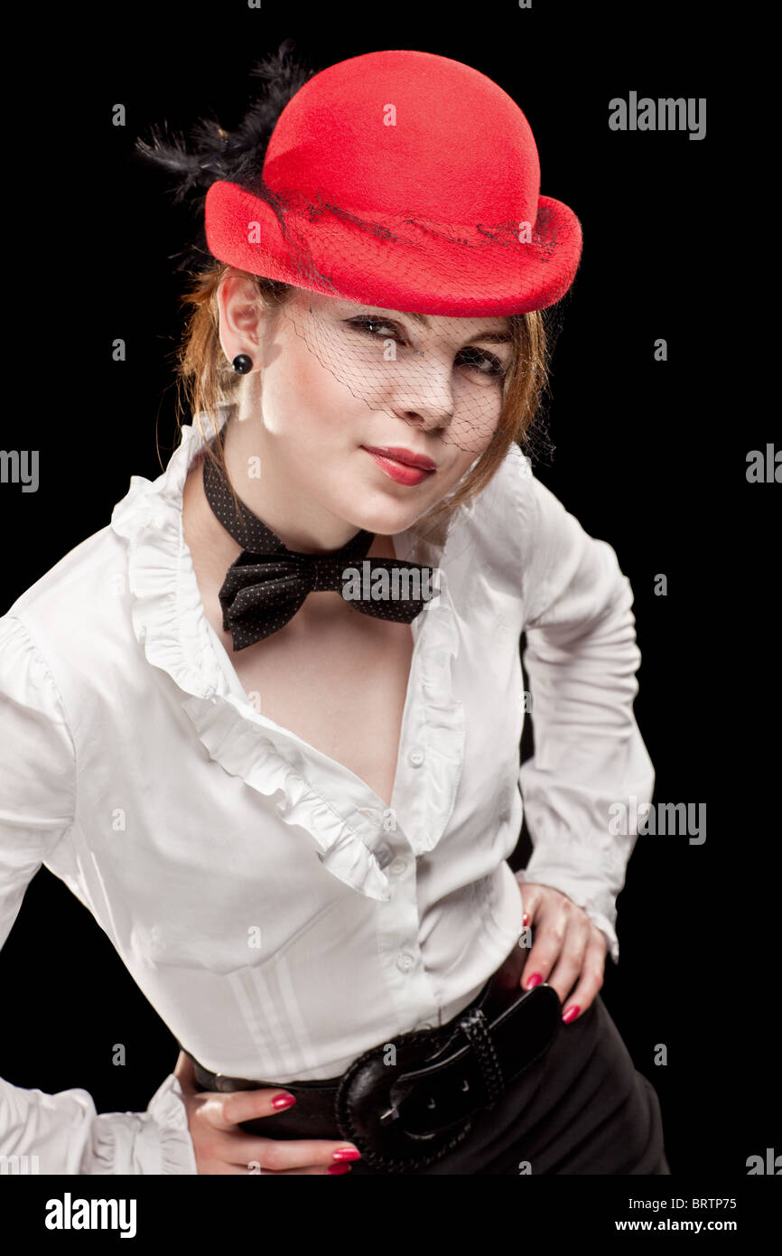 Portrait of a pretty young woman with red bonnet Stock Photo - Alamy