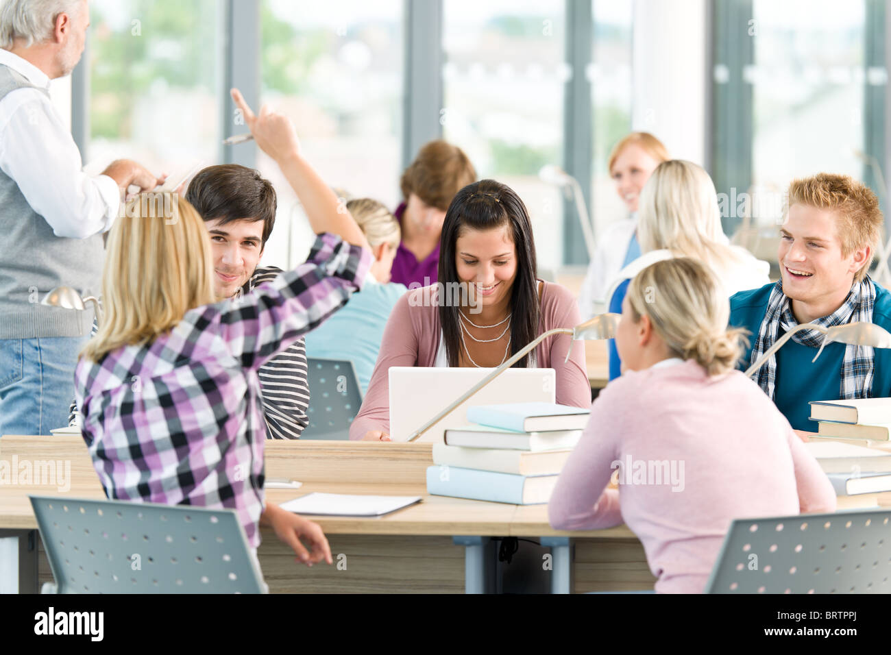 Group of students study in classroom at highschool with professor Stock ...