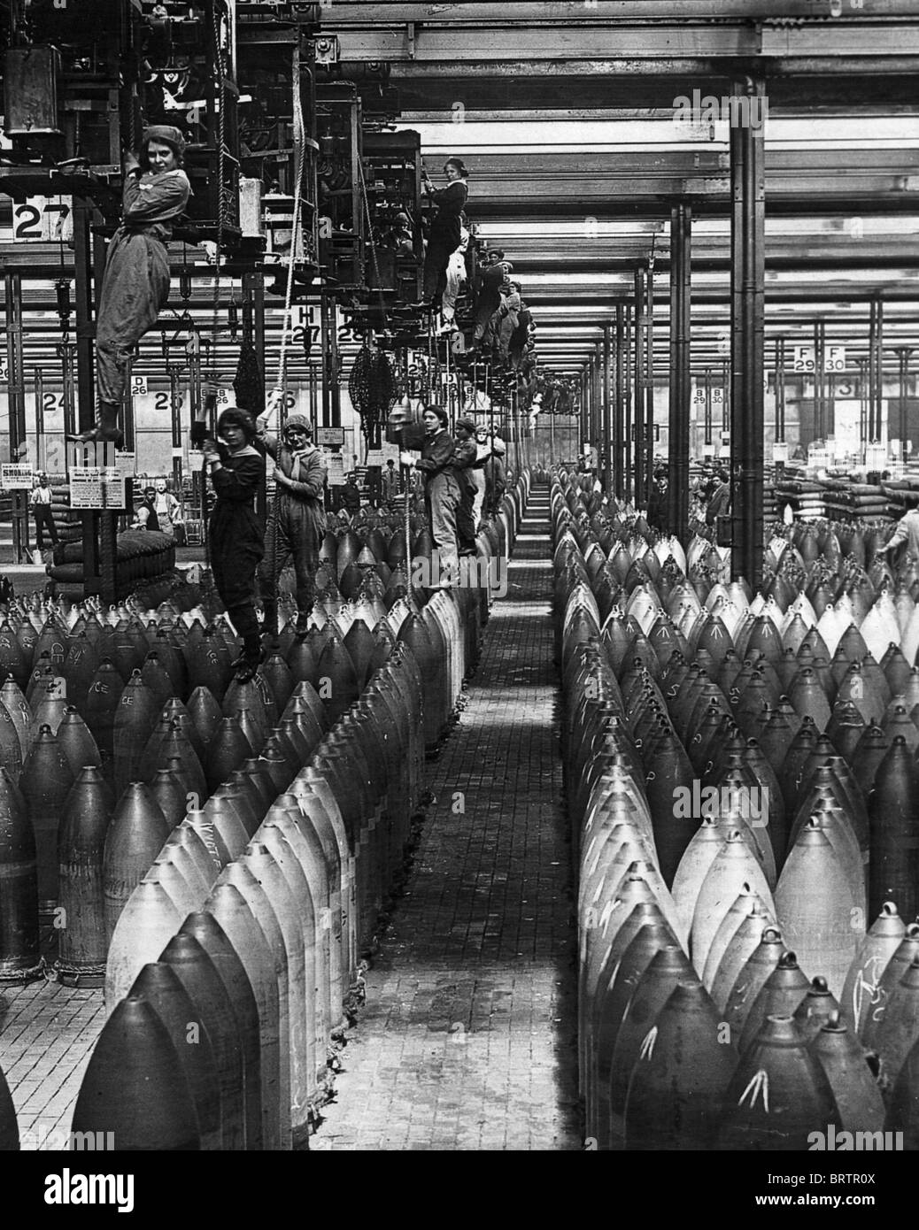 BRITISH MUNITIONS FACTORY with women workers during WW!. Stock Photo