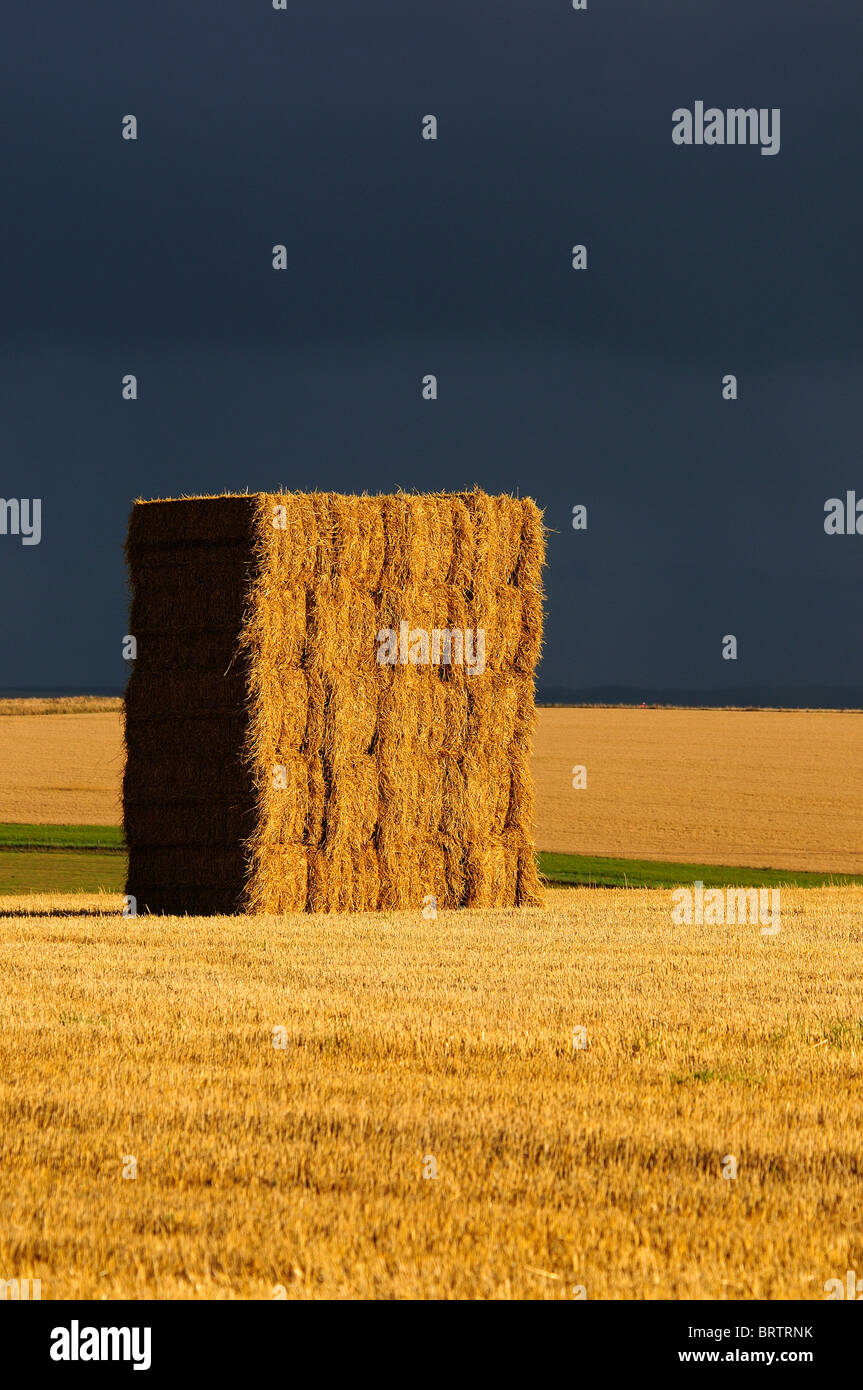 A large stack of straw after bales after harvest near Kingston Deverill